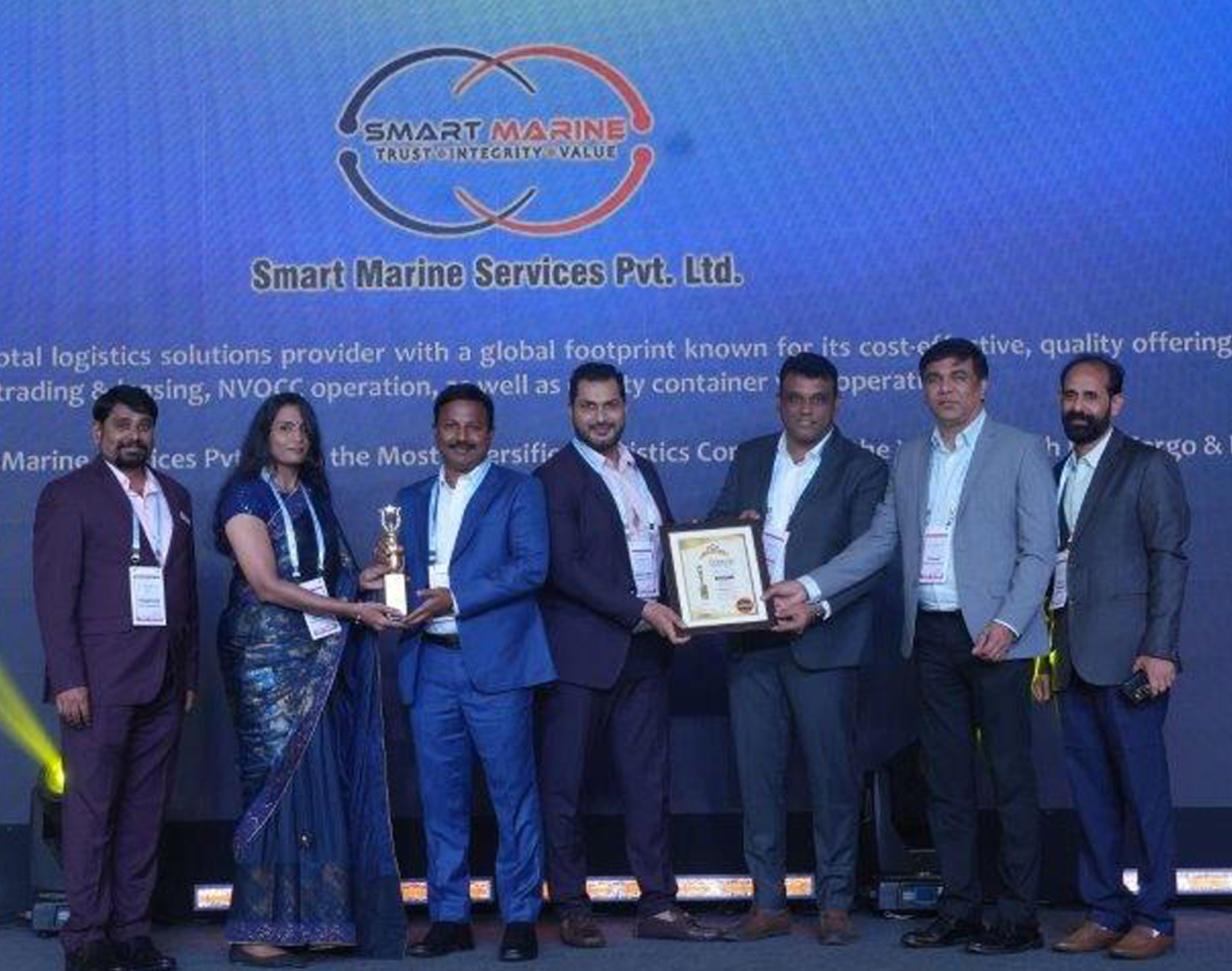 Team receiving logistics company award 2025
